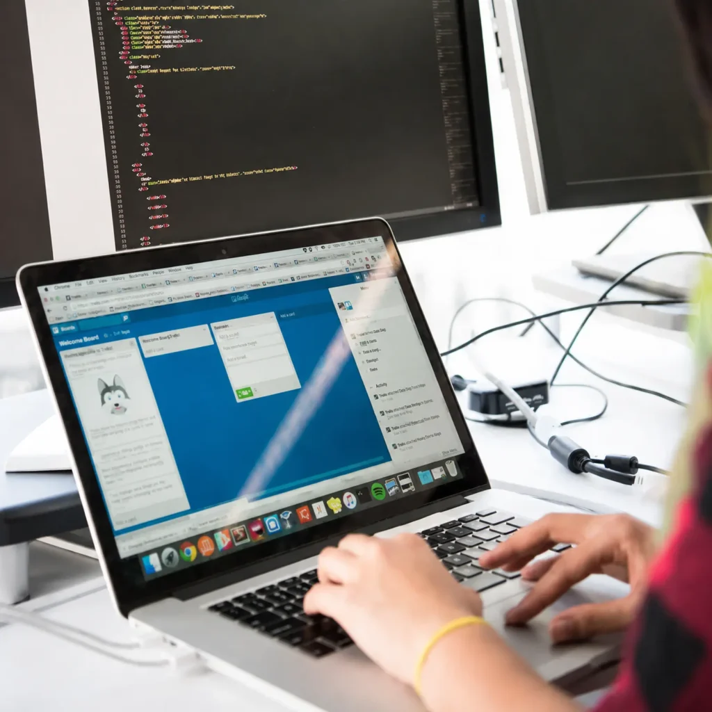 X-Dynamics engineer developing 3D vision software at a computer workstation
